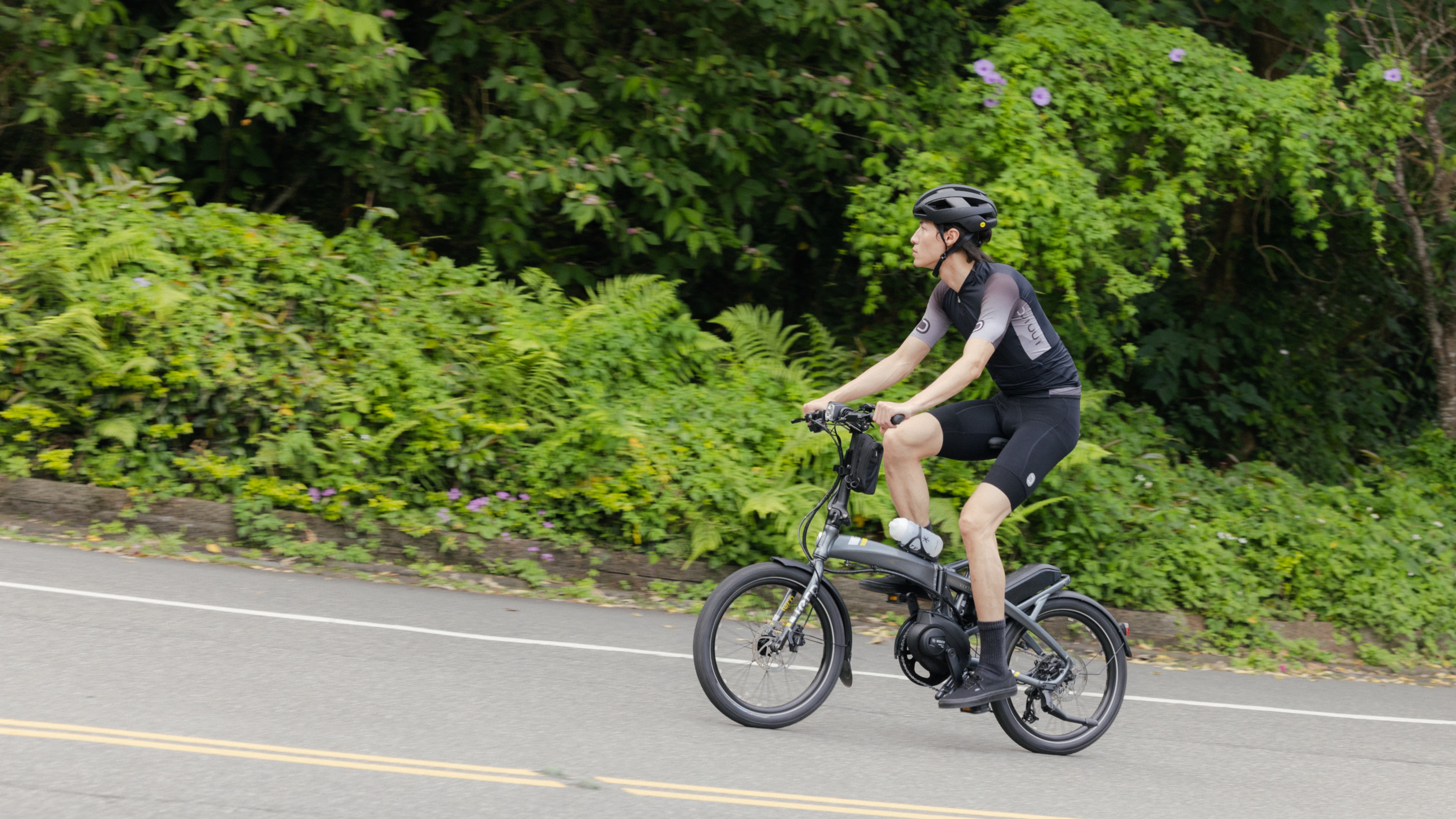 A man ride on the Vektron in the country road